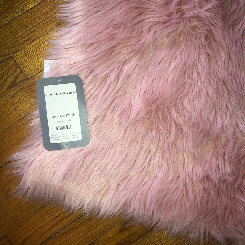 Faux fur pink rug